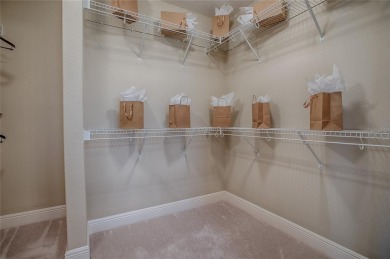 Welcome to Your Dream Retreat with this Aspen designer model on Egret Championship Golf Course in Florida - for sale on GolfHomes.com, golf home, golf lot