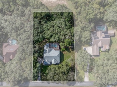 Welcome to your retreat in the heart of Citrus County! This on Twisted Oaks Golf Club in Florida - for sale on GolfHomes.com, golf home, golf lot