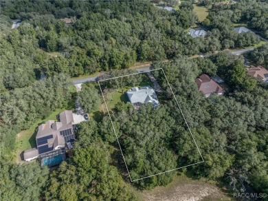 Well-maintained 3BR/3BA pool home in Fairview Estates on 1.10 on Twisted Oaks Golf Club in Florida - for sale on GolfHomes.com, golf home, golf lot