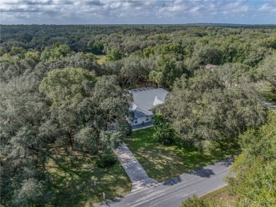 Well-maintained 3BR/3BA pool home in Fairview Estates on 1.10 on Twisted Oaks Golf Club in Florida - for sale on GolfHomes.com, golf home, golf lot