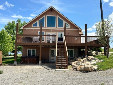 Are you looking for a family Cabin in Bear Lake? Look no further on Bear Lake West Golf and Country Club in Idaho - for sale on GolfHomes.com, golf home, golf lot