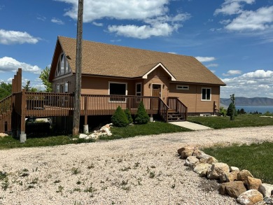 Are you looking for a family Cabin in Bear Lake? Look no further on Bear Lake West Golf and Country Club in Idaho - for sale on GolfHomes.com, golf home, golf lot