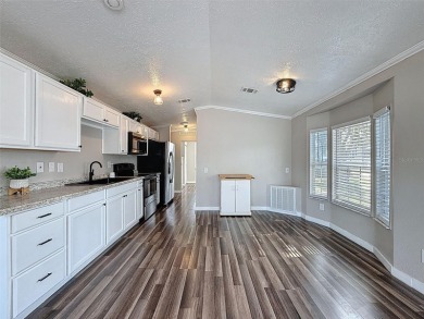 NO LOT RENT, it is a deeded lot, 2 bedrooms 1 Bath. A/C 2018 and on Glen Lakes Country Club in Florida - for sale on GolfHomes.com, golf home, golf lot