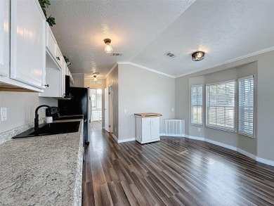 NO LOT RENT, it is a deeded lot, 2 bedrooms 1 Bath. A/C 2018 and on Glen Lakes Country Club in Florida - for sale on GolfHomes.com, golf home, golf lot