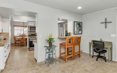 Discover this meticulously 4 bed, 3.5 bath custom home on a on Mesa Country Club in Arizona - for sale on GolfHomes.com, golf home, golf lot