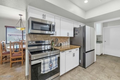 Discover this meticulously 4 bed, 3.5 bath custom home on a on Mesa Country Club in Arizona - for sale on GolfHomes.com, golf home, golf lot