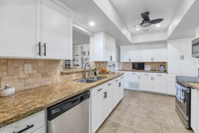 Discover this meticulously 4 bed, 3.5 bath custom home on a on Mesa Country Club in Arizona - for sale on GolfHomes.com, golf home, golf lot