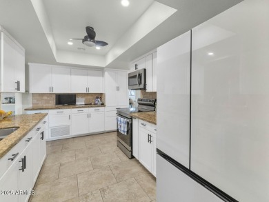 Discover this meticulously 4 bed, 3.5 bath custom home on a on Mesa Country Club in Arizona - for sale on GolfHomes.com, golf home, golf lot