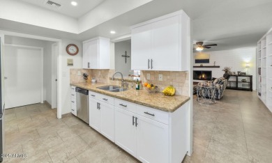 Discover this meticulously 4 bed, 3.5 bath custom home on a on Mesa Country Club in Arizona - for sale on GolfHomes.com, golf home, golf lot
