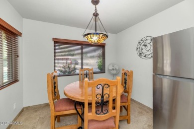 Discover this meticulously 4 bed, 3.5 bath custom home on a on Mesa Country Club in Arizona - for sale on GolfHomes.com, golf home, golf lot