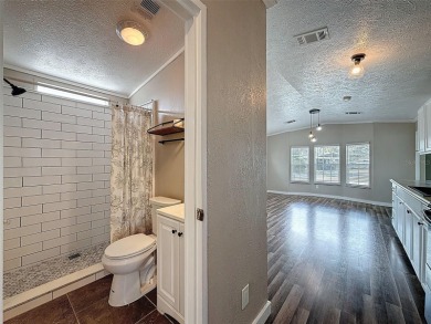 NO LOT RENT, it is a deeded lot, 2 bedrooms 1 Bath. A/C 2018 and on Glen Lakes Country Club in Florida - for sale on GolfHomes.com, golf home, golf lot