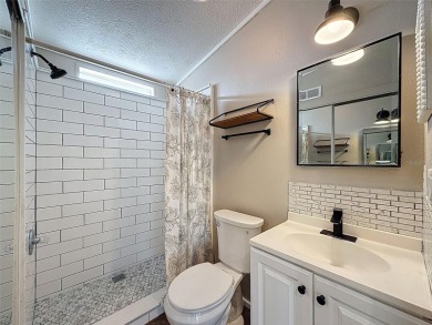 NO LOT RENT, it is a deeded lot, 2 bedrooms 1 Bath. A/C 2018 and on Glen Lakes Country Club in Florida - for sale on GolfHomes.com, golf home, golf lot