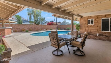 Discover this meticulously 4 bed, 3.5 bath custom home on a on Mesa Country Club in Arizona - for sale on GolfHomes.com, golf home, golf lot