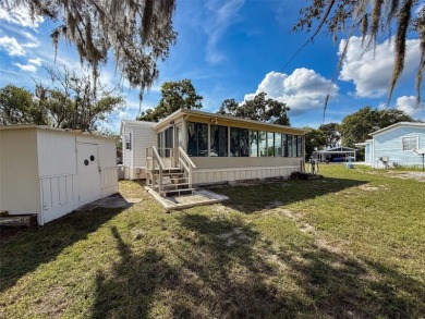 NO LOT RENT, it is a deeded lot, 2 bedrooms 1 Bath. A/C 2018 and on Glen Lakes Country Club in Florida - for sale on GolfHomes.com, golf home, golf lot