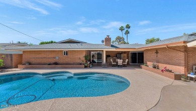 Discover this meticulously 4 bed, 3.5 bath custom home on a on Mesa Country Club in Arizona - for sale on GolfHomes.com, golf home, golf lot