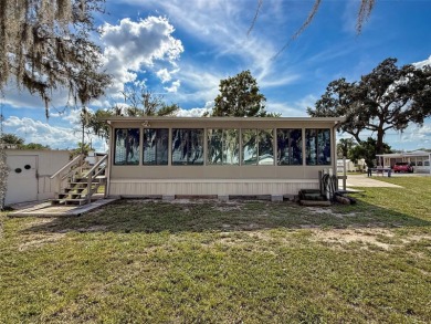 NO LOT RENT, it is a deeded lot, 2 bedrooms 1 Bath. A/C 2018 and on Glen Lakes Country Club in Florida - for sale on GolfHomes.com, golf home, golf lot