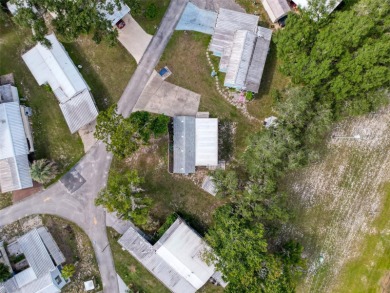 NO LOT RENT, it is a deeded lot, 2 bedrooms 1 Bath. A/C 2018 and on Glen Lakes Country Club in Florida - for sale on GolfHomes.com, golf home, golf lot