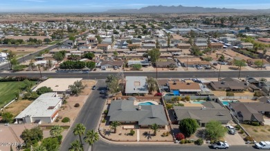 Discover this meticulously 4 bed, 3.5 bath custom home on a on Mesa Country Club in Arizona - for sale on GolfHomes.com, golf home, golf lot
