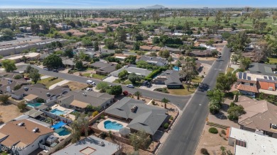 Discover this meticulously 4 bed, 3.5 bath custom home on a on Mesa Country Club in Arizona - for sale on GolfHomes.com, golf home, golf lot