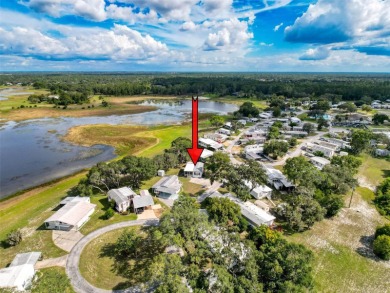 NO LOT RENT, it is a deeded lot, 2 bedrooms 1 Bath. A/C 2018 and on Glen Lakes Country Club in Florida - for sale on GolfHomes.com, golf home, golf lot