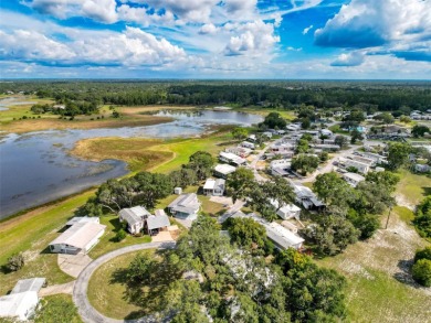 NO LOT RENT, it is a deeded lot, 2 bedrooms 1 Bath. A/C 2018 and on Glen Lakes Country Club in Florida - for sale on GolfHomes.com, golf home, golf lot