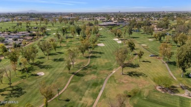 Discover this meticulously 4 bed, 3.5 bath custom home on a on Mesa Country Club in Arizona - for sale on GolfHomes.com, golf home, golf lot