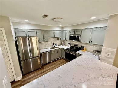 Newly renovated with brand new furnishings, fresh interior paint on Rumbling Bald Resort on Lake Lure in North Carolina - for sale on GolfHomes.com, golf home, golf lot