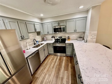 Newly renovated with brand new furnishings, fresh interior paint on Rumbling Bald Resort on Lake Lure in North Carolina - for sale on GolfHomes.com, golf home, golf lot