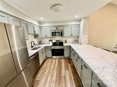Newly renovated with brand new furnishings, fresh interior paint on Rumbling Bald Resort on Lake Lure in North Carolina - for sale on GolfHomes.com, golf home, golf lot