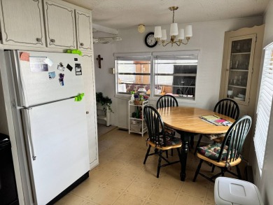 Welcome to this charming and inviting1967 double-wide home, With on Heather Hills Golf Course in Florida - for sale on GolfHomes.com, golf home, golf lot