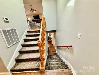 Newly renovated with brand new furnishings, fresh interior paint on Rumbling Bald Resort on Lake Lure in North Carolina - for sale on GolfHomes.com, golf home, golf lot