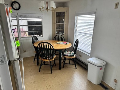 Welcome to this charming and inviting1967 double-wide home, With on Heather Hills Golf Course in Florida - for sale on GolfHomes.com, golf home, golf lot