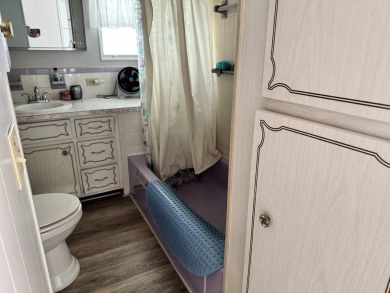 Welcome to this charming and inviting1967 double-wide home, With on Heather Hills Golf Course in Florida - for sale on GolfHomes.com, golf home, golf lot