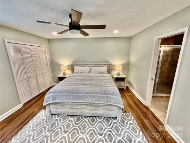 Newly renovated with brand new furnishings, fresh interior paint on Rumbling Bald Resort on Lake Lure in North Carolina - for sale on GolfHomes.com, golf home, golf lot