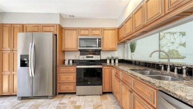Welcome to this beautifully updated 2-bedroom, 2-bath villa in on The Meadows Golf and Country Club in Florida - for sale on GolfHomes.com, golf home, golf lot
