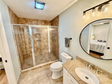 Newly renovated with brand new furnishings, fresh interior paint on Rumbling Bald Resort on Lake Lure in North Carolina - for sale on GolfHomes.com, golf home, golf lot