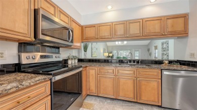 Welcome to this beautifully updated 2-bedroom, 2-bath villa in on The Meadows Golf and Country Club in Florida - for sale on GolfHomes.com, golf home, golf lot