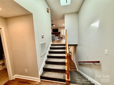 Newly renovated with brand new furnishings, fresh interior paint on Rumbling Bald Resort on Lake Lure in North Carolina - for sale on GolfHomes.com, golf home, golf lot