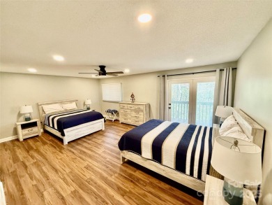 Newly renovated with brand new furnishings, fresh interior paint on Rumbling Bald Resort on Lake Lure in North Carolina - for sale on GolfHomes.com, golf home, golf lot