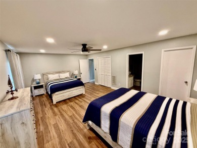 Newly renovated with brand new furnishings, fresh interior paint on Rumbling Bald Resort on Lake Lure in North Carolina - for sale on GolfHomes.com, golf home, golf lot