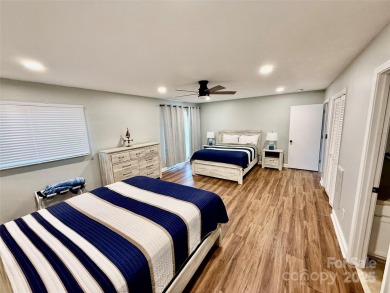 Newly renovated with brand new furnishings, fresh interior paint on Rumbling Bald Resort on Lake Lure in North Carolina - for sale on GolfHomes.com, golf home, golf lot