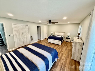 Newly renovated with brand new furnishings, fresh interior paint on Rumbling Bald Resort on Lake Lure in North Carolina - for sale on GolfHomes.com, golf home, golf lot
