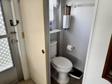 Welcome to this charming and inviting1967 double-wide home, With on Heather Hills Golf Course in Florida - for sale on GolfHomes.com, golf home, golf lot