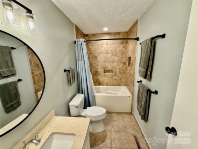 Newly renovated with brand new furnishings, fresh interior paint on Rumbling Bald Resort on Lake Lure in North Carolina - for sale on GolfHomes.com, golf home, golf lot