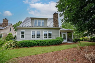 Welcome to this charming 3-bedroom, 3.5-bathroom Landing cottage on Reynolds Lake Oconee - The Landing in Georgia - for sale on GolfHomes.com, golf home, golf lot