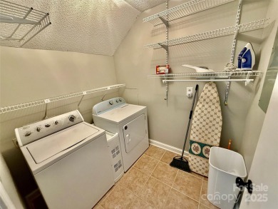 Newly renovated with brand new furnishings, fresh interior paint on Rumbling Bald Resort on Lake Lure in North Carolina - for sale on GolfHomes.com, golf home, golf lot