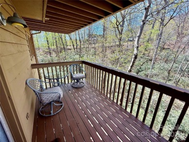 Newly renovated with brand new furnishings, fresh interior paint on Rumbling Bald Resort on Lake Lure in North Carolina - for sale on GolfHomes.com, golf home, golf lot