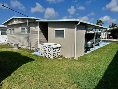 Welcome to this charming and inviting1967 double-wide home, With on Heather Hills Golf Course in Florida - for sale on GolfHomes.com, golf home, golf lot