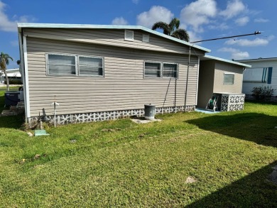 Welcome to this charming and inviting1967 double-wide home, With on Heather Hills Golf Course in Florida - for sale on GolfHomes.com, golf home, golf lot