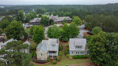 Welcome to this charming 3-bedroom, 3.5-bathroom Landing cottage on Reynolds Lake Oconee - The Landing in Georgia - for sale on GolfHomes.com, golf home, golf lot